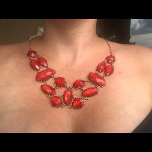 Red jewels statement piece.